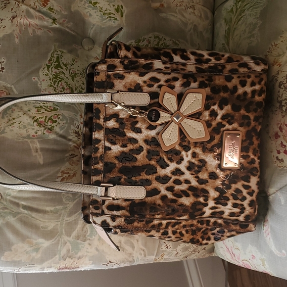 guess purses leopard print inside